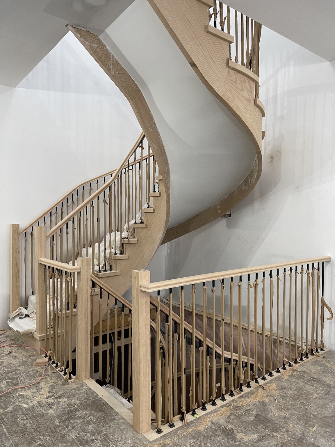 Curved wood stairs & railings