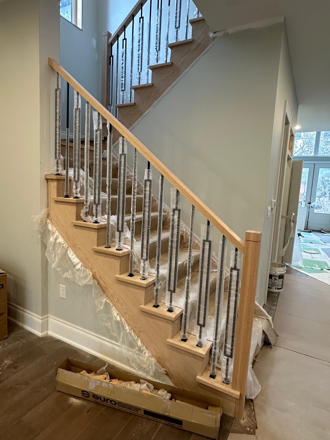 Wood handrail & metal picket installation